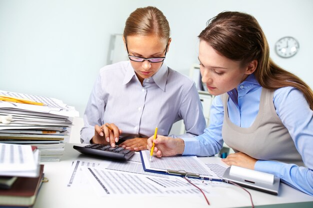 Accountant reviewing figures with a client