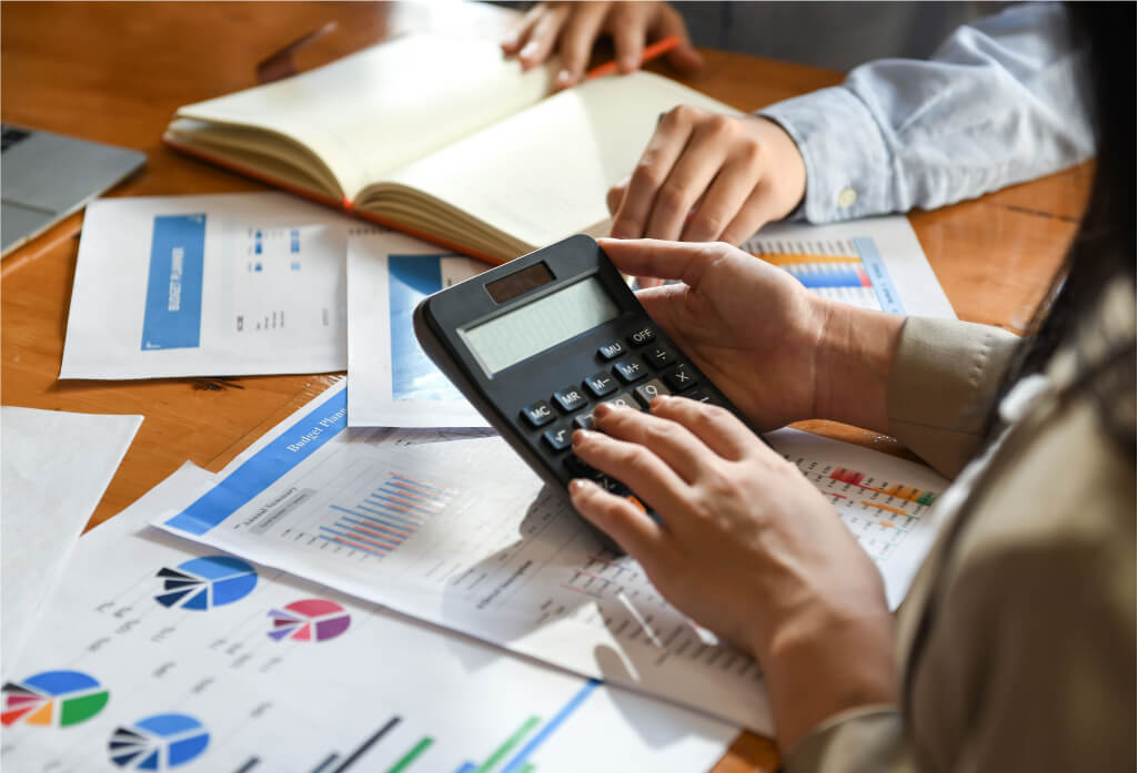Accountant using a calculator